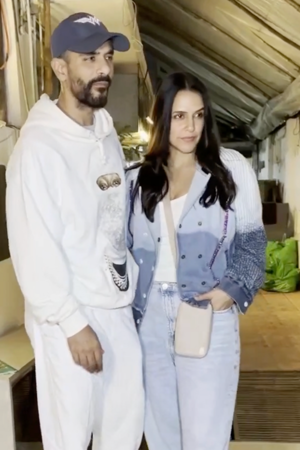 Neha Dhupia In Beige Day to Night Set with Round pouch and generic pouch only