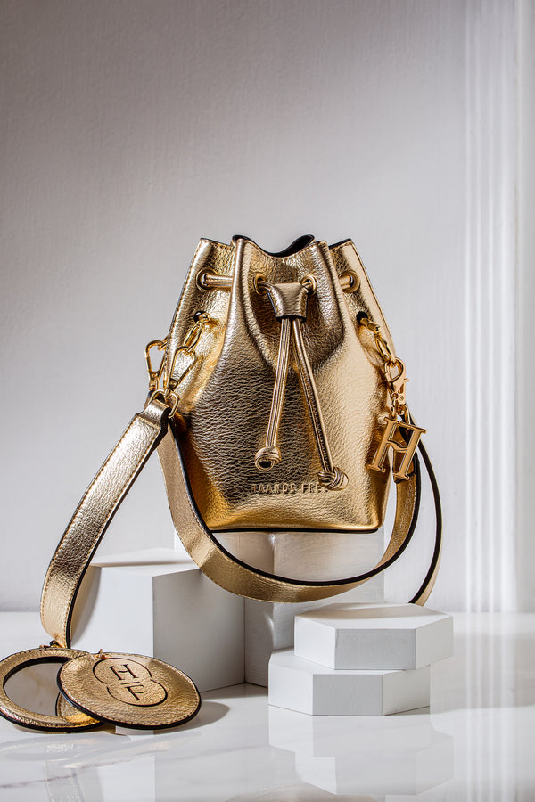 Gold vegan leather bucket bag with short detachable strap and long detachable body strap Only