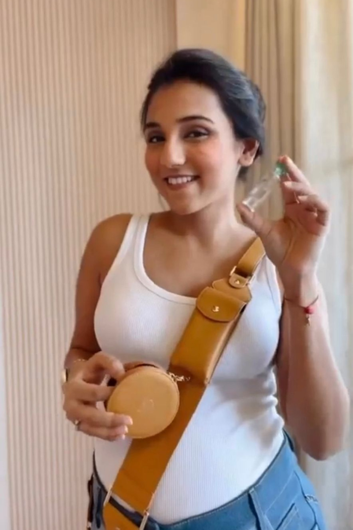 Masoom Minawala In Camel adjustable Utility Crossbody strap with Matching phone cover